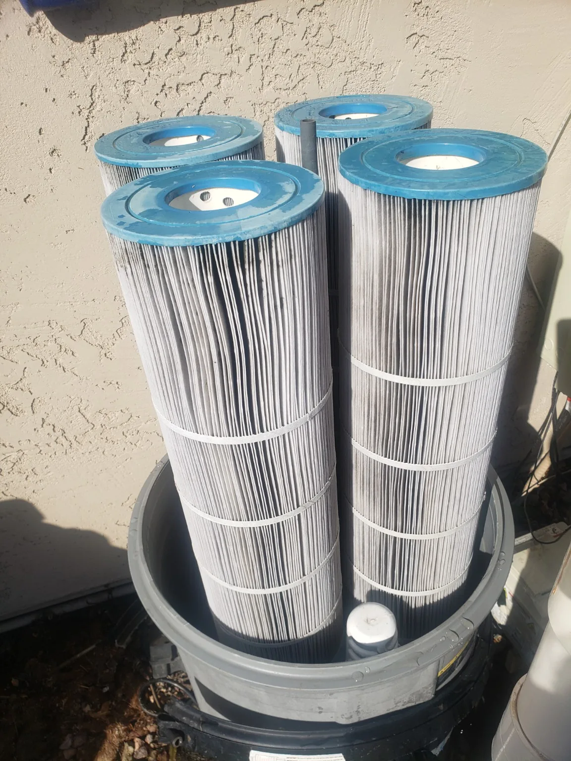 Clean pool filter cartridges