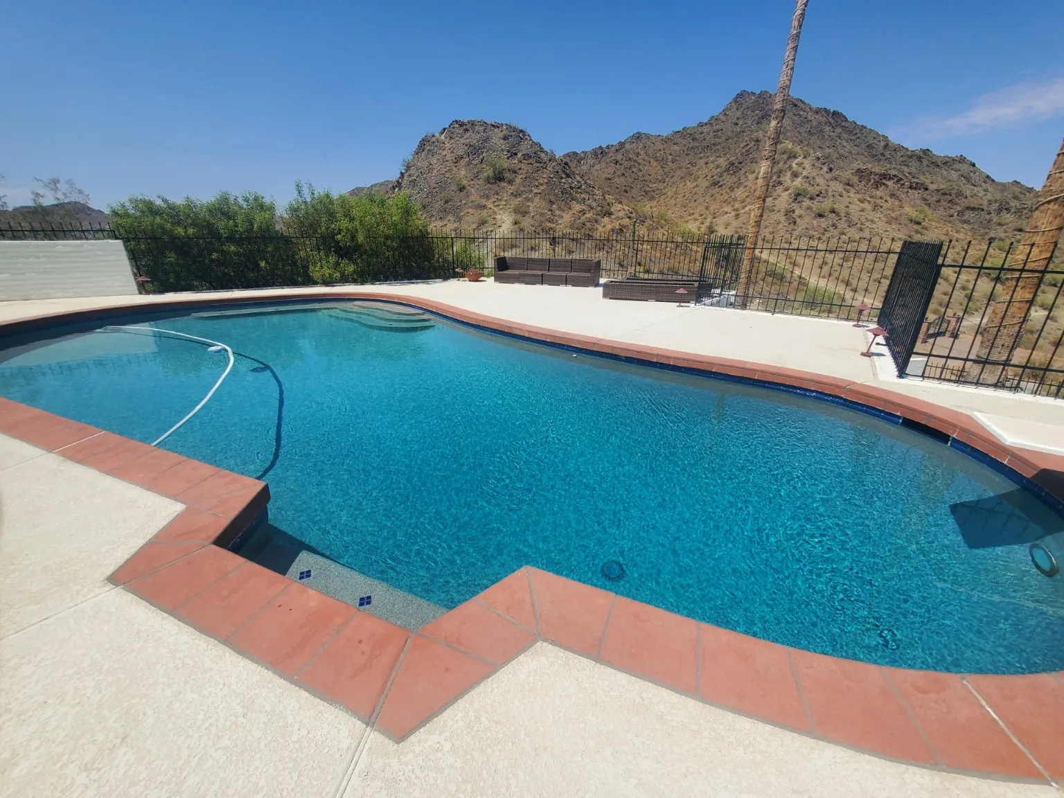 Clean Arizona swimming pool with mountain view